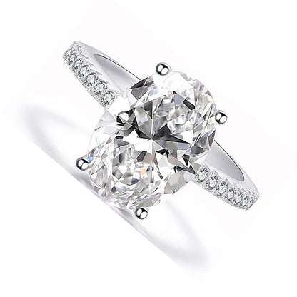 The Katherine Oval Cut Pave Moissanite Solitaire Ring