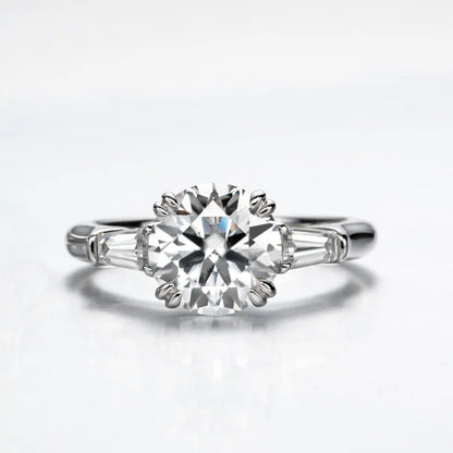 The Grace Round Cut Side Stone Moissanite Ring - Solstice