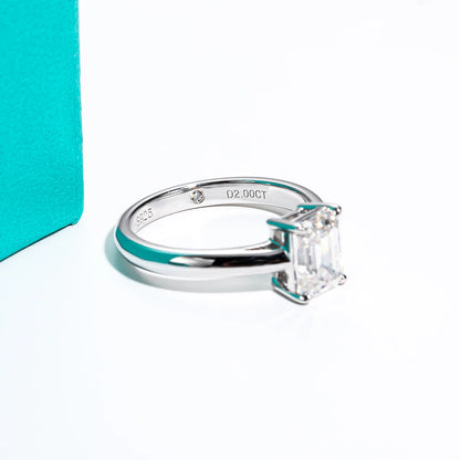 The Margaret Emerald Cut Hidden Stone Moissanite Ring - Solstice