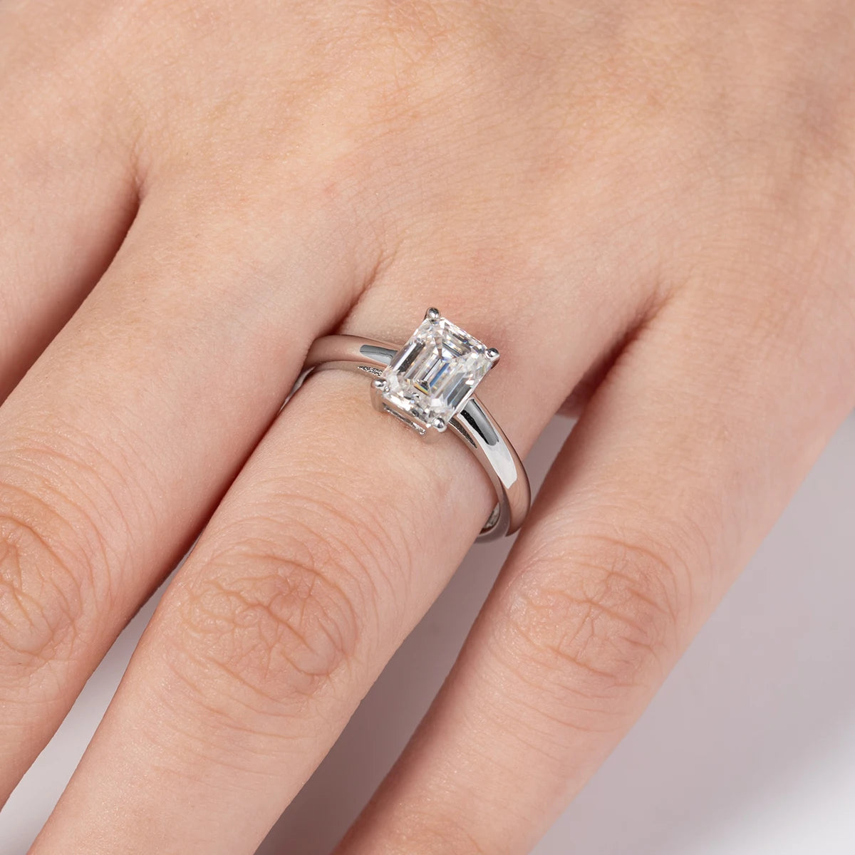 The Margaret Emerald Cut Hidden Stone Moissanite Ring - Solstice