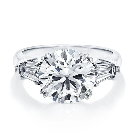 The Grace Round Cut Side Stone Moissanite Ring