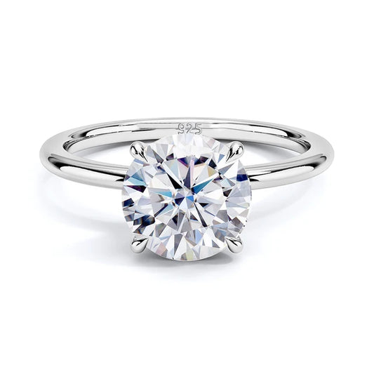 #e3e3de; silver moissanite engagement ring on hand – The Diana